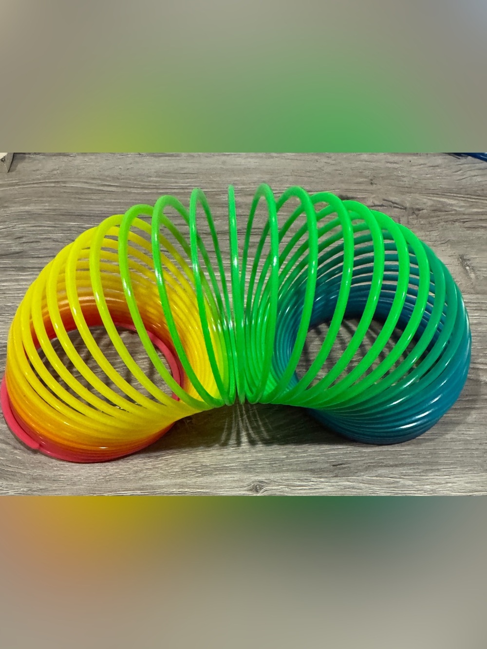 Multicolor Plastic Coil Spring Toy - Bright Rainbow Slinky